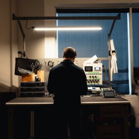 Transom employee working on product electronic controls